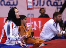 مربی زن تیم تکواندوی مردان +تصاویر